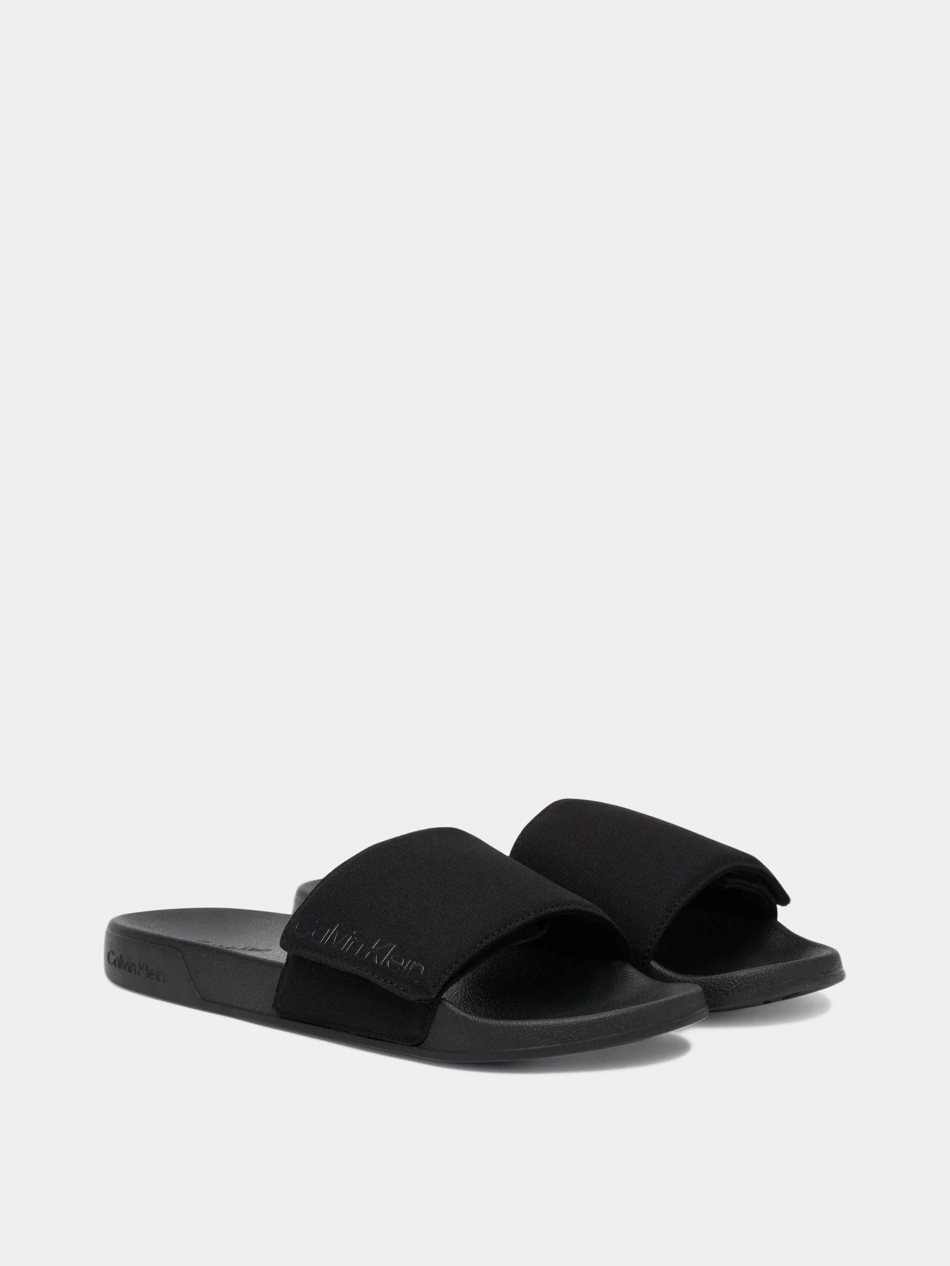 Шлёпанцы Calvin Klein модель HM0HM02115-0GJ Шлёпанцы Calvin Klein модель HM0HM02115-0GJ Фото