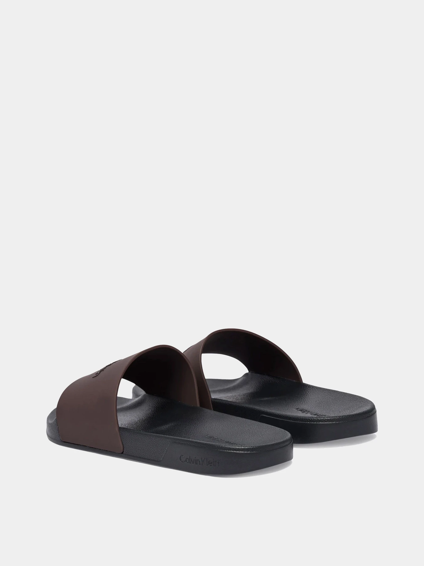 Шлёпанцы Calvin Klein модель HM0HM02107-0KP Шлёпанцы Calvin Klein модель HM0HM02107-0KP Фото