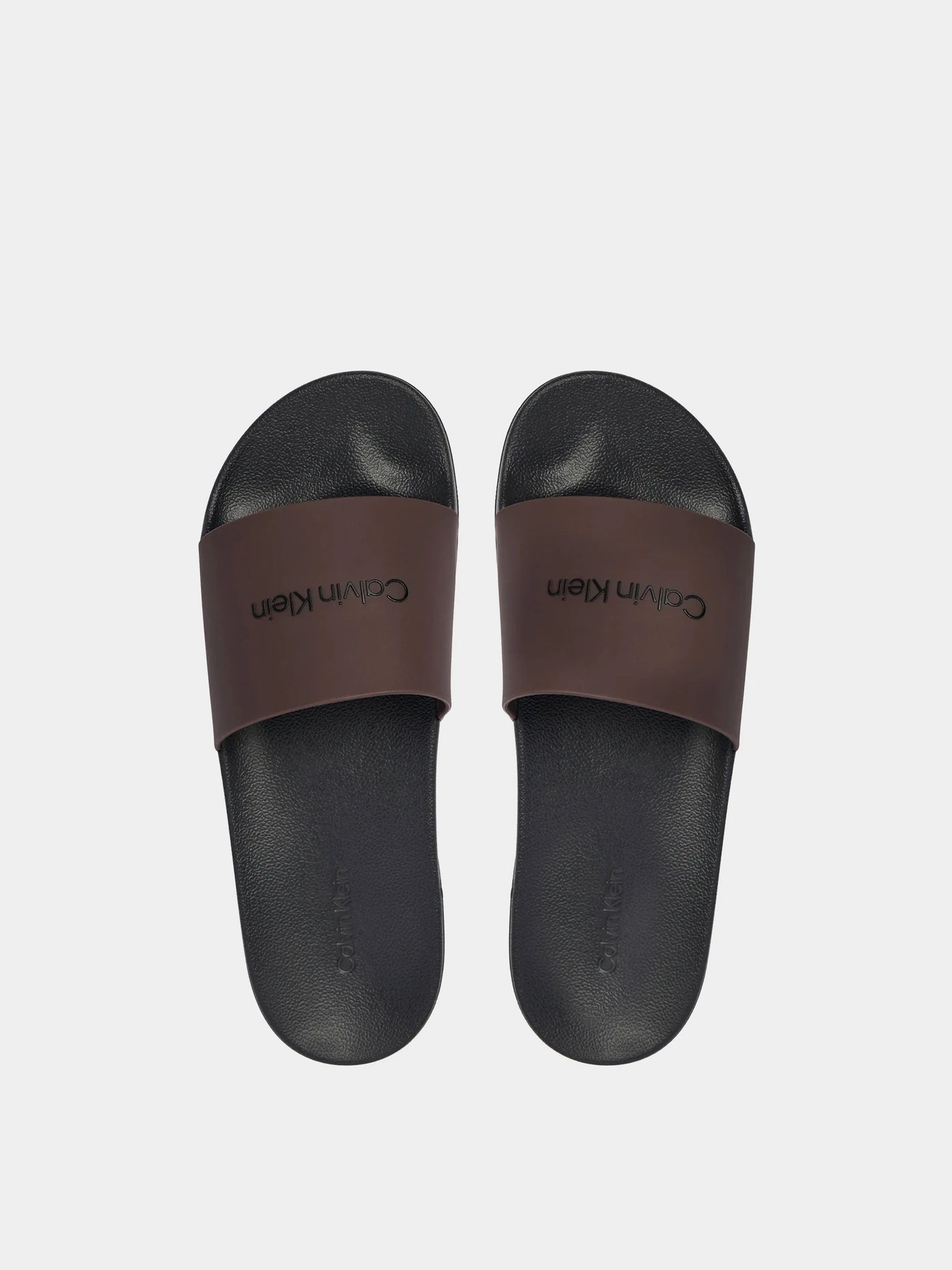 Шлёпанцы Calvin Klein модель HM0HM02107-0KP Шлёпанцы Calvin Klein модель HM0HM02107-0KP Фото